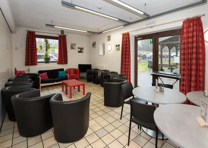 De La Roche - Champlon Ostello